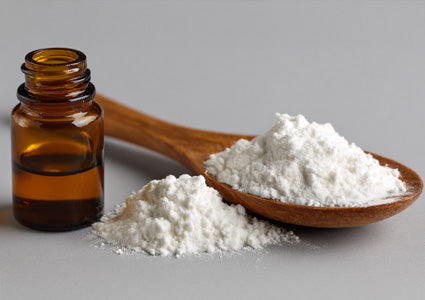 L-histidine brown bottle and wooden spoon with white powders on a gray background